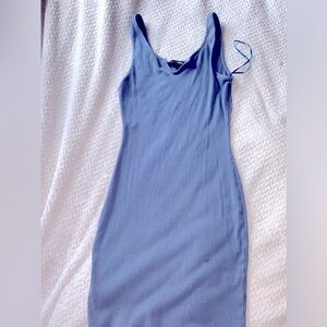 Woman’s tight fitted short dress. Size S